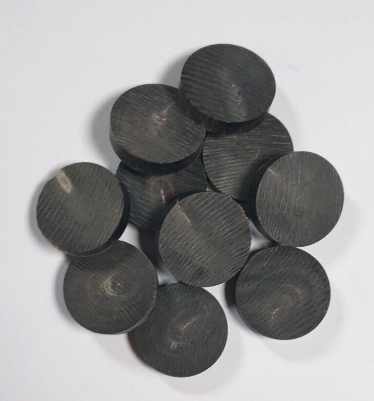 Natural horn button blanks on a white background